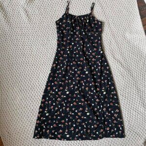 black floral midi dress with adjustable spaghetti straps